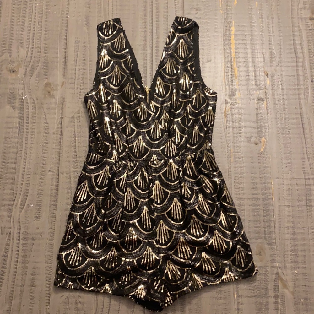 Black sparkly romper perfect for New Years